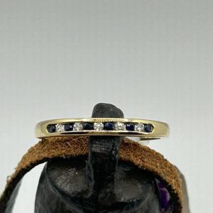 Blue sapphire and diamond band