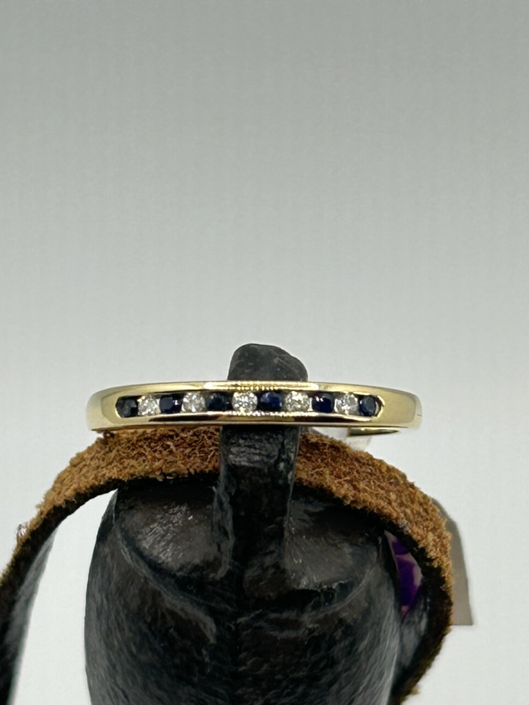 Blue sapphire and diamond band